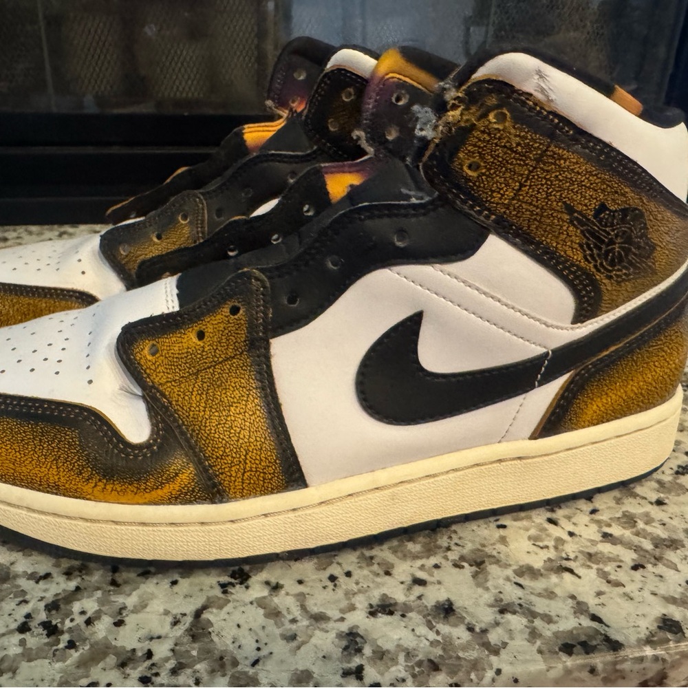 Jordan 1 mids Sneakers in Black, White, and Gold/yellowish